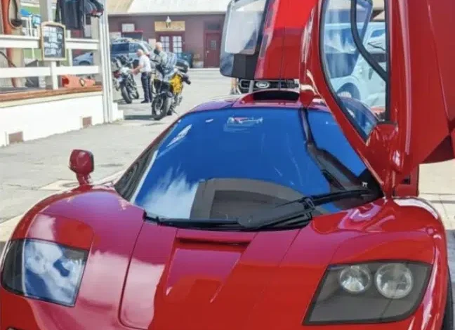 OpenAI founder and CEO Sam Altman lets a father and son take a look at his million McLaren F1 OpenAI founder and CEO Sam Altman lets a father and son take a look at his million McLaren F1