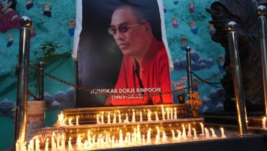 China detains Tibetans for sharing photos of late Buddhist leader